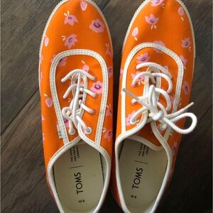 TOMS Vibrant Orange Sneakers with Pink Floral Design